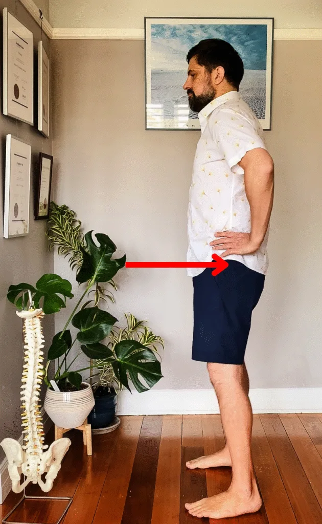 Osteopath for back pain Warrnambool demo: torso hinging forward from hips, glutes back, back still flat to spare lumbar discs.