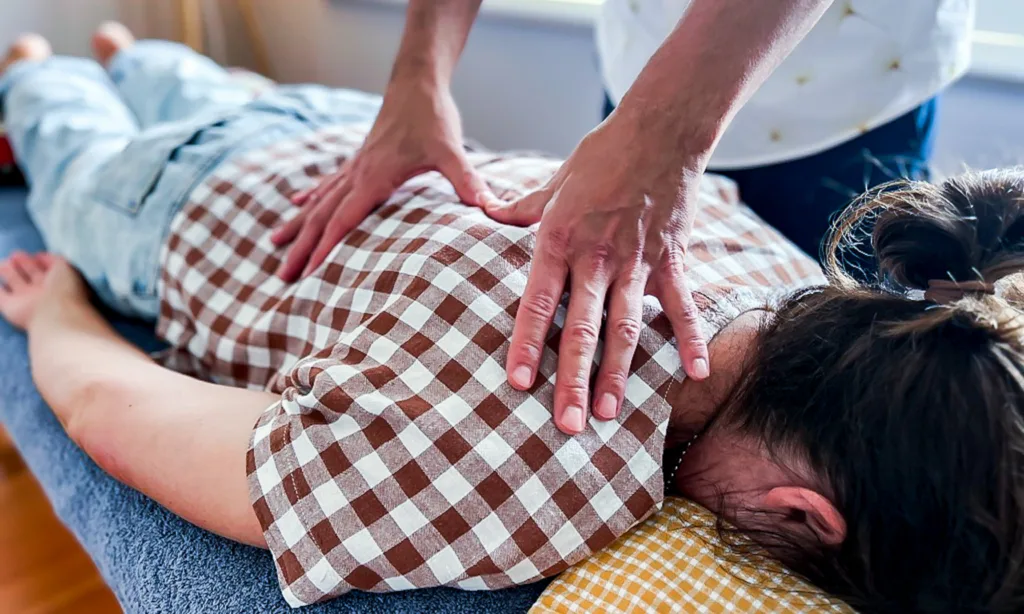Osteopath performing hands-on treatment as part of holistic osteopathic care in Warrnambool 3